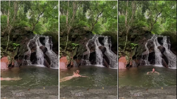 Irina se refrescando no rio completamente pelada